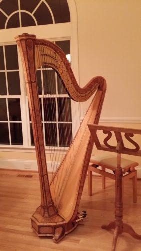 Antique concert harp - delicate instruments safely moved by Ladd Moving